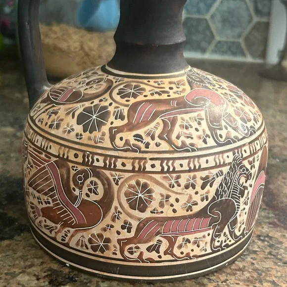 Handcrafted Ceramic Pitcher with Intricate Design - Picture 9 of 10